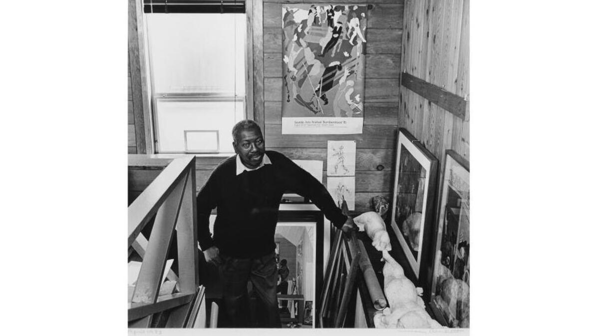 Portrait of artist Jacob Lawrence, a silver gelatin print by Mary Randlett was a gift of the Washington Art Consortium through a gift of Safeco Insurance, a member of the Liberty Mutual Group, to the Whatcom Museum.