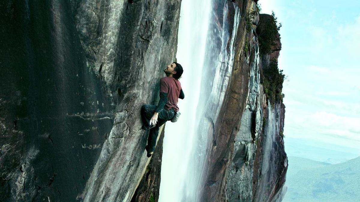 Edgar Ramirez plays Bodhi in a scene from “Point Break,” a remake of the 1990s cult classic.