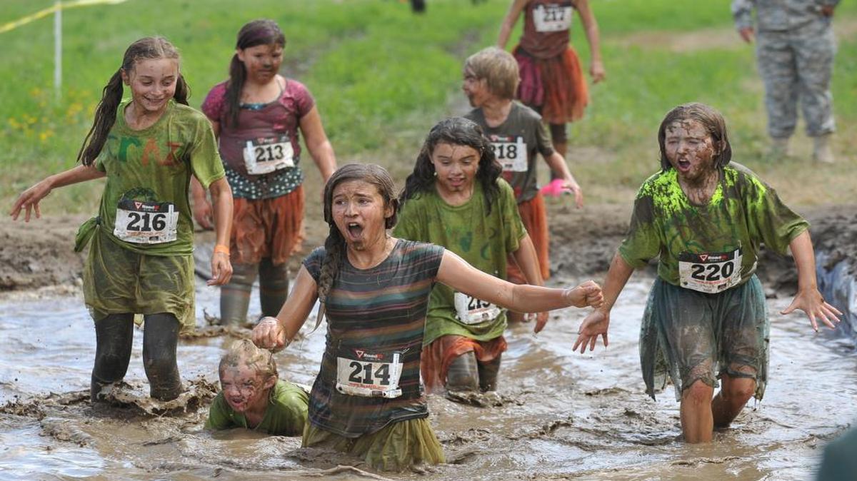 
Participants reacts to an ice-filled mud pit at the 2013 Muds to Suds Race. The 2015 race is Aug. 29 at Hovander Homestead Park in Ferndale.
