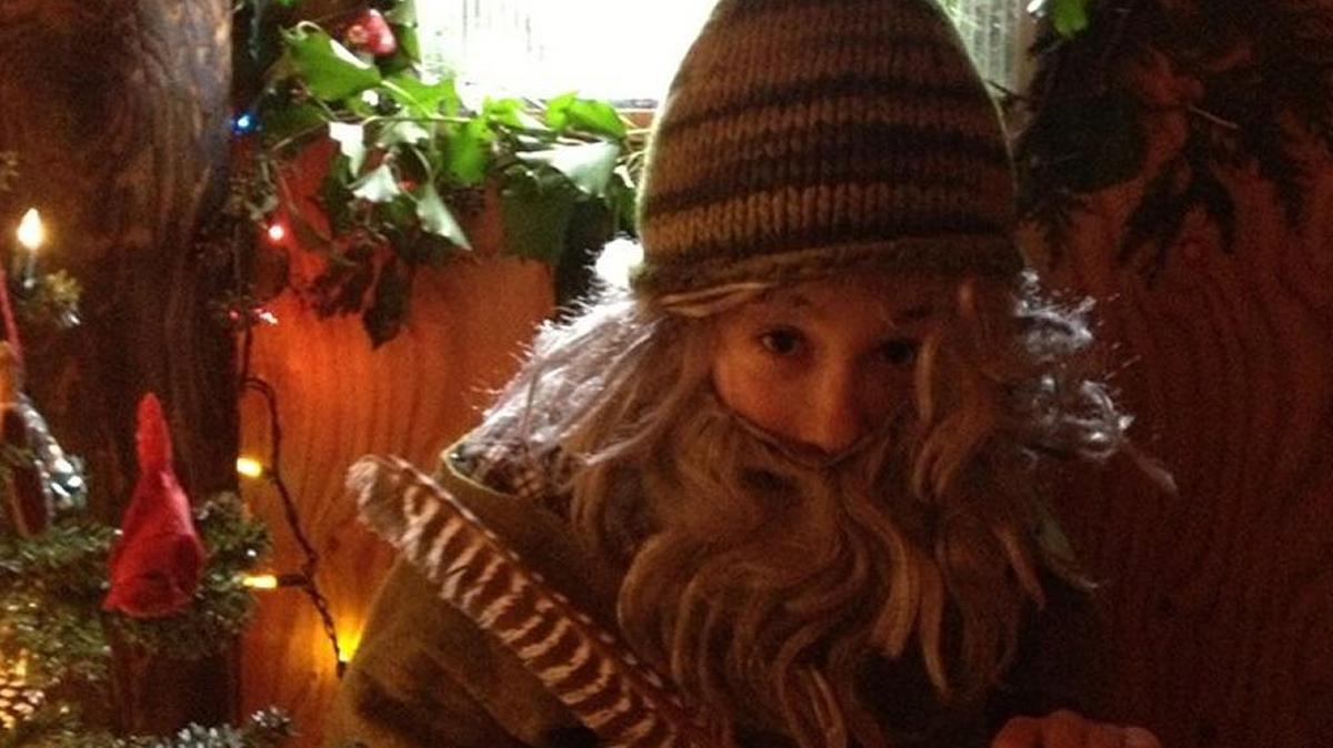 A visit with a gnome is part of the annual Waldorf Christmas Faire.