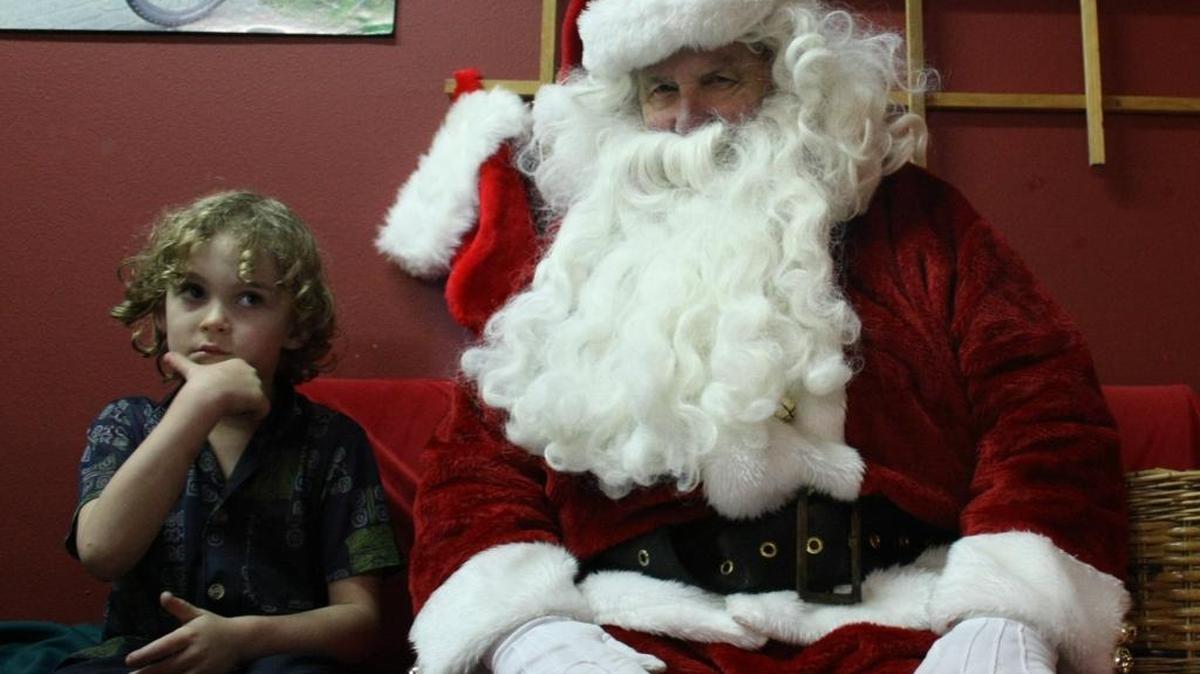 Santa talks with a child during Holiday Harbor Lights. The Blaine event is Saturday, Dec. 2, at the H Street Plaza with entertainment from 1 to 6 p.m., tree lighting at 4:30 p.m. followed by visits, and pictures, with Santa until 7 p.m.