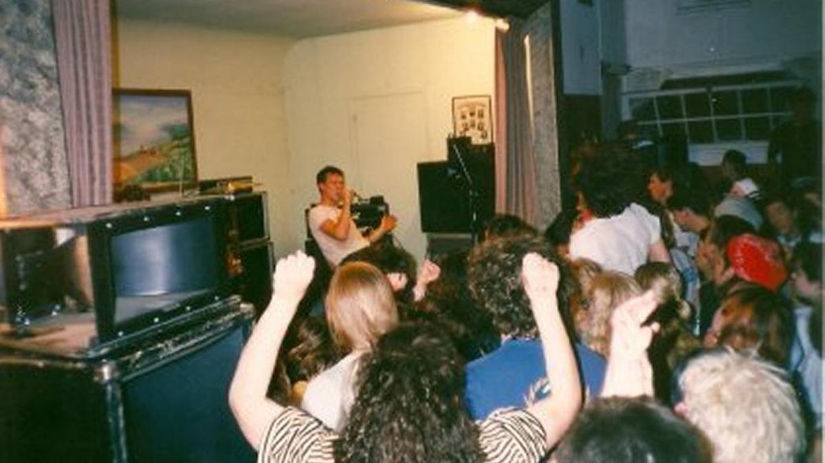 Calvin Johnson from Beat Happening performs June 2, 1990, at the Chambers Prairie Grange.