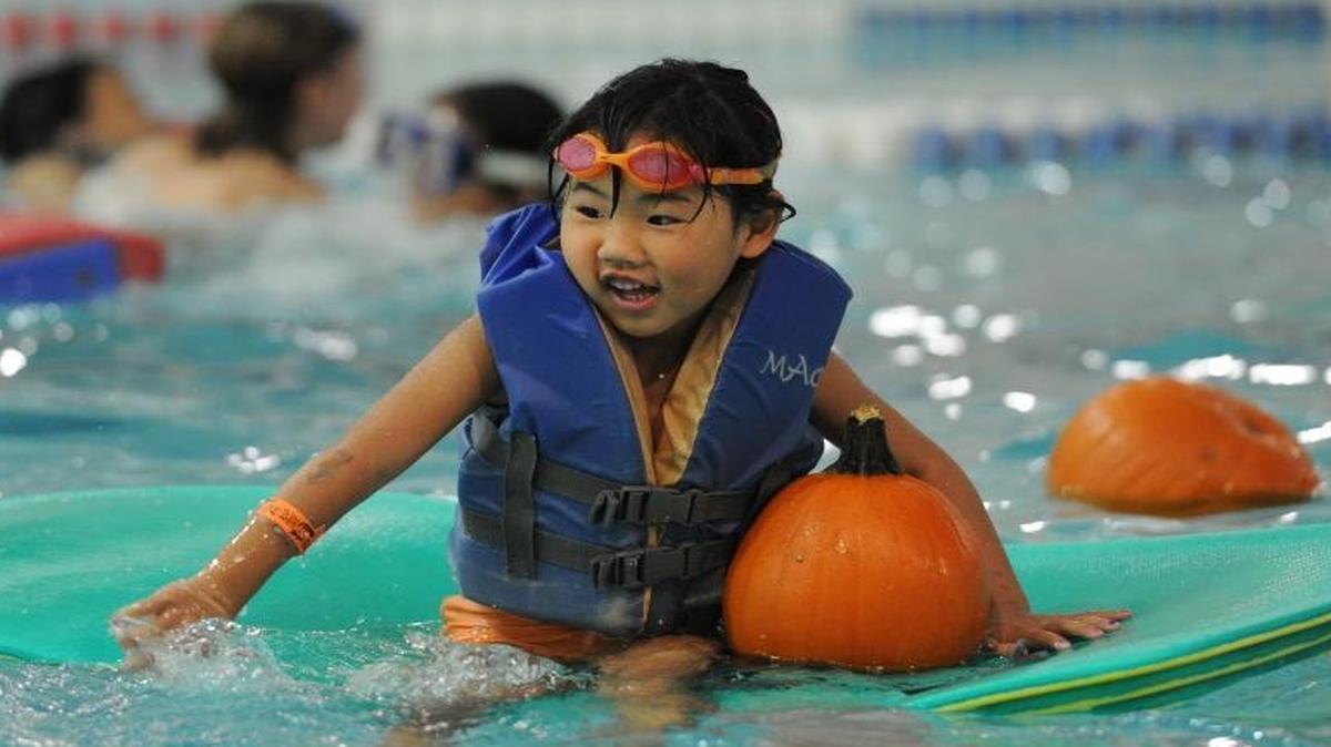 
At Arne Hanna Aquatic Center’s annual Pumpkin Patch in the Pool event, lifeguards throw dozens of pumpkins into the pools, and let children pick their favorite to take home. The 2015 event is 4:30 to 6:30 p.m. Saturday, Oct, 24, and costs $5 per person, while pumpkins last.
