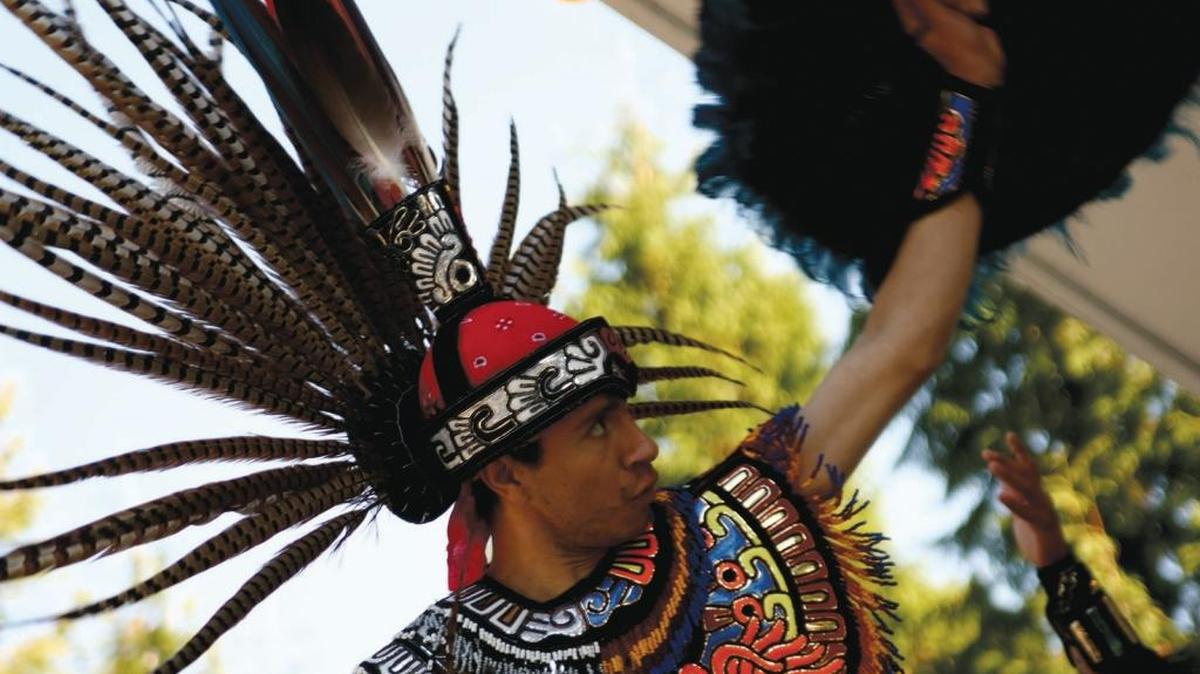 Marco Morales of Ameyaltonal Aztec Dancers raises a traditional Aztecan shield while performing during the Fiestas Patrias festival in 2012. The 2016 fiesta will be from noon to 6 p.m. Saturday, Sept. 3, at Pioneer Park