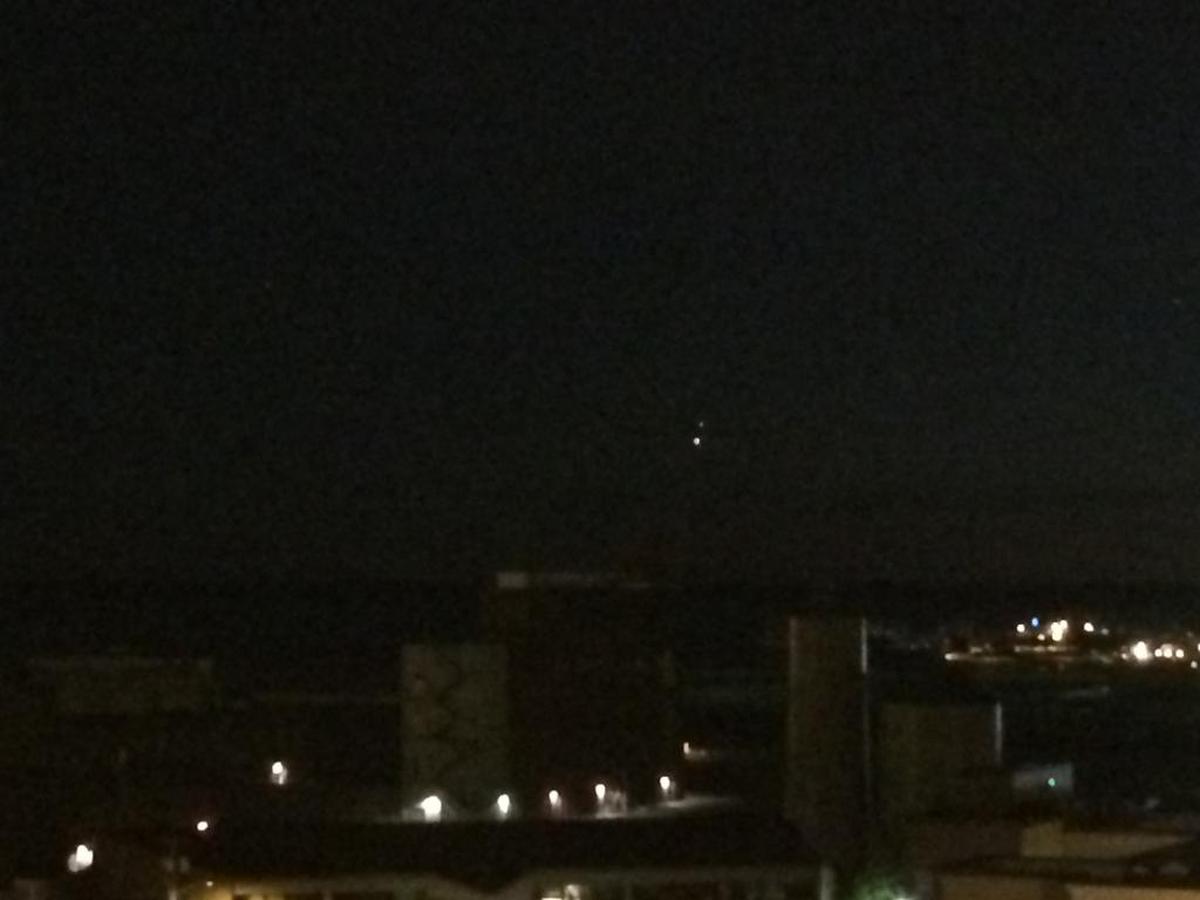 Venus and Jupiter are shown at conjunction in summer 2015 over Bellingham Bay.