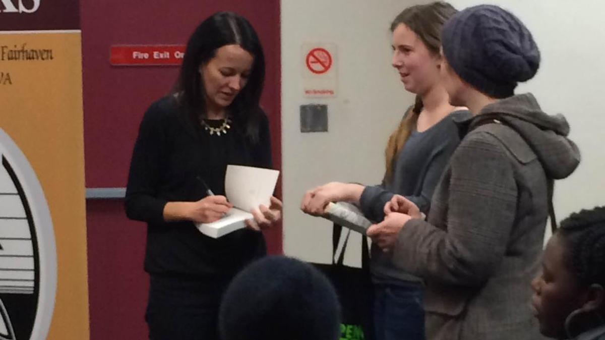 Bestselling teen writer Allie Condie signs copies of “Matched” during a recent event at the Bellingham Public Library.