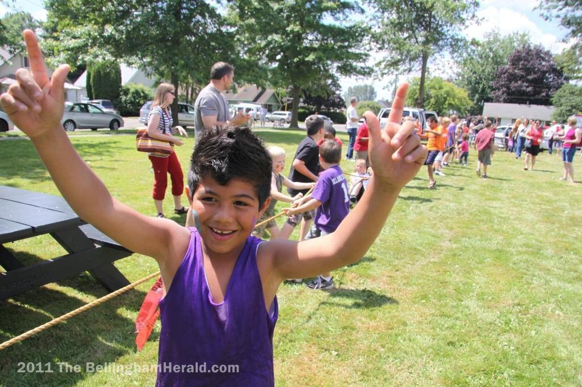 Families attend the Everson- Nooksack Summer Festival parade in 2011 at Everson City Park in Everson.