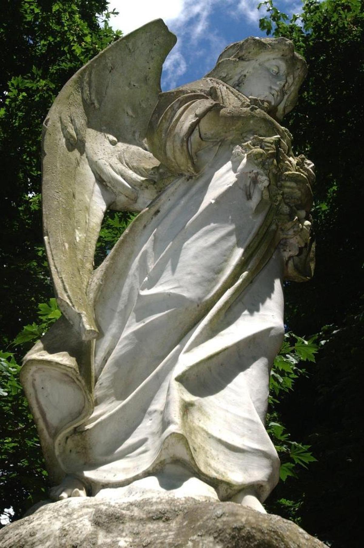 The statue of an angel stands in Bayview Cemetery.