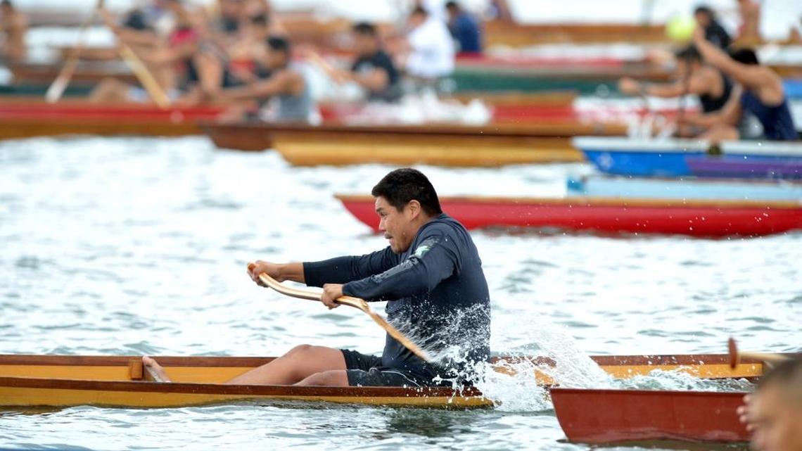 Where can you watch war canoe races and learn to play bone games?