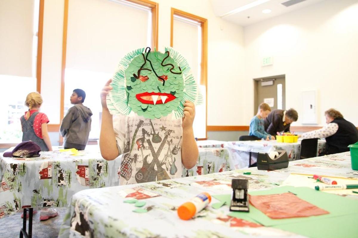 Ben Wohlrab shows his Creature of the Black Lagoon mask at the Lynden Public Library in 2012.