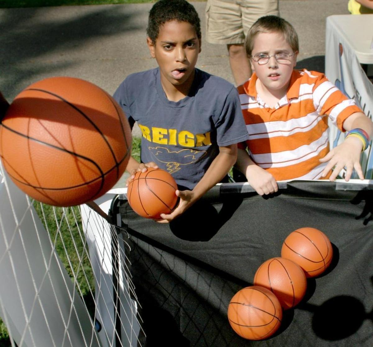 Michael Simoneau, left, and Mark Simoneau, shoot for a high score at Kid’s Fest in 2007 at Bloedel Donovan Park.