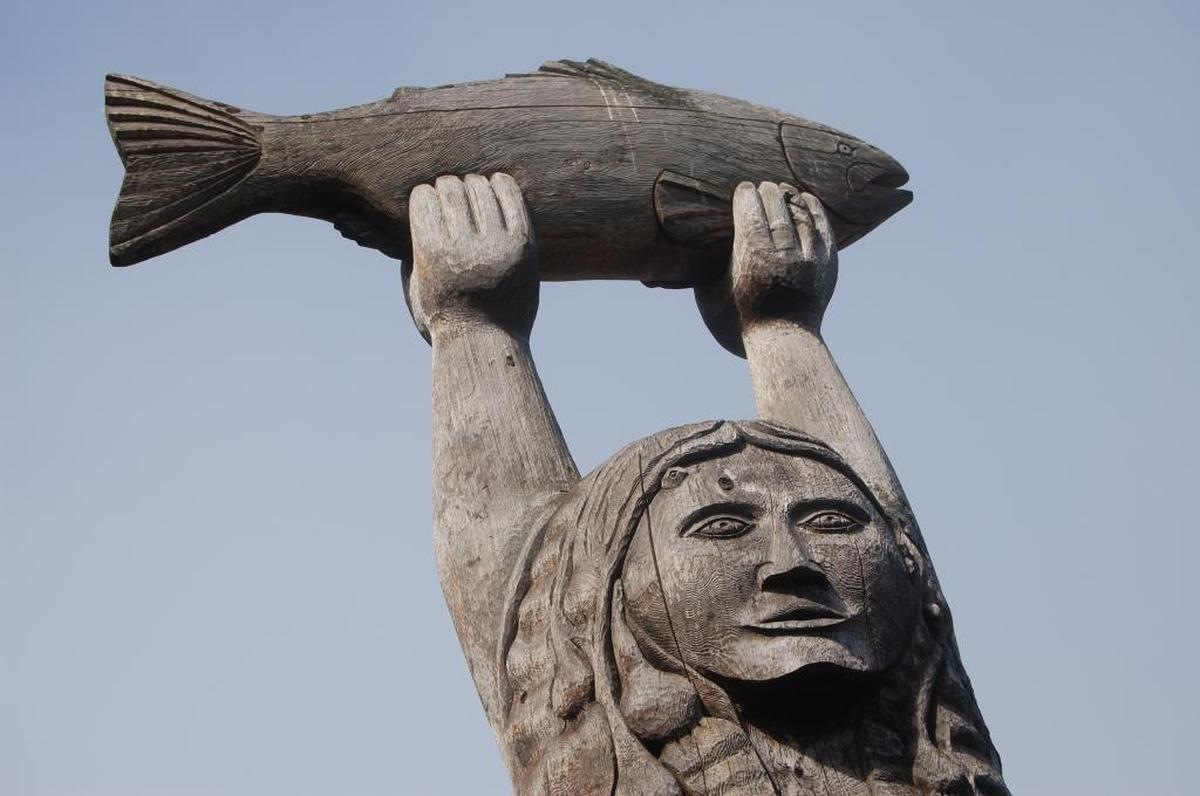 A statue depicting a Native American legend adorns the shore near Rosario Head, a popular tide-pooling site at Deception Pass State Park.