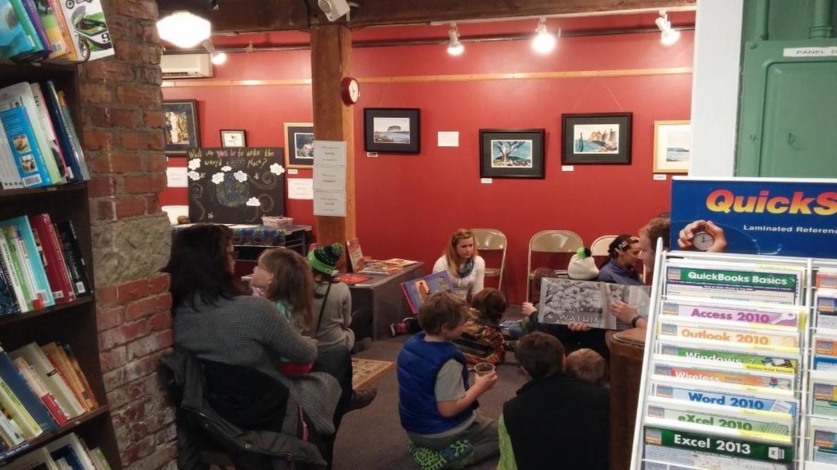Participants in the 2015 Martin Luther King Jr. Day Read-In gather in the downstairs Readings Gallery of Village Books.