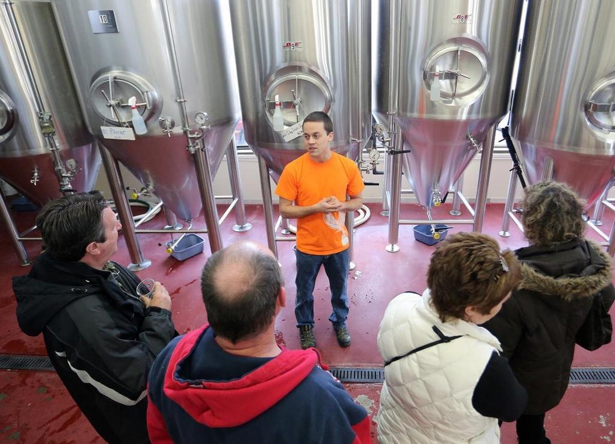 Michael Toomes, a brewer at Chuckanut Brewery, answers questions during an open house in February 2013. Tours are offered Saturday, Feb. 20, 2016 at 12:30 p.m., 1:30 p.m., 2:30 p.m. and 3:30 p.m.