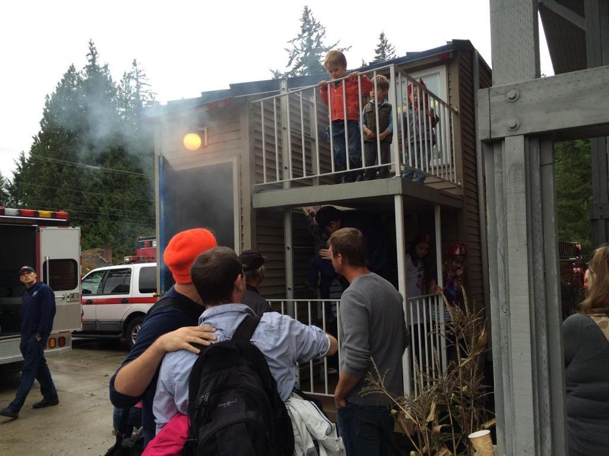 Smoke drifts from the Fire Safety House at South Whatcom Fire Authority’s Station 21 in Geneva in October 2015.