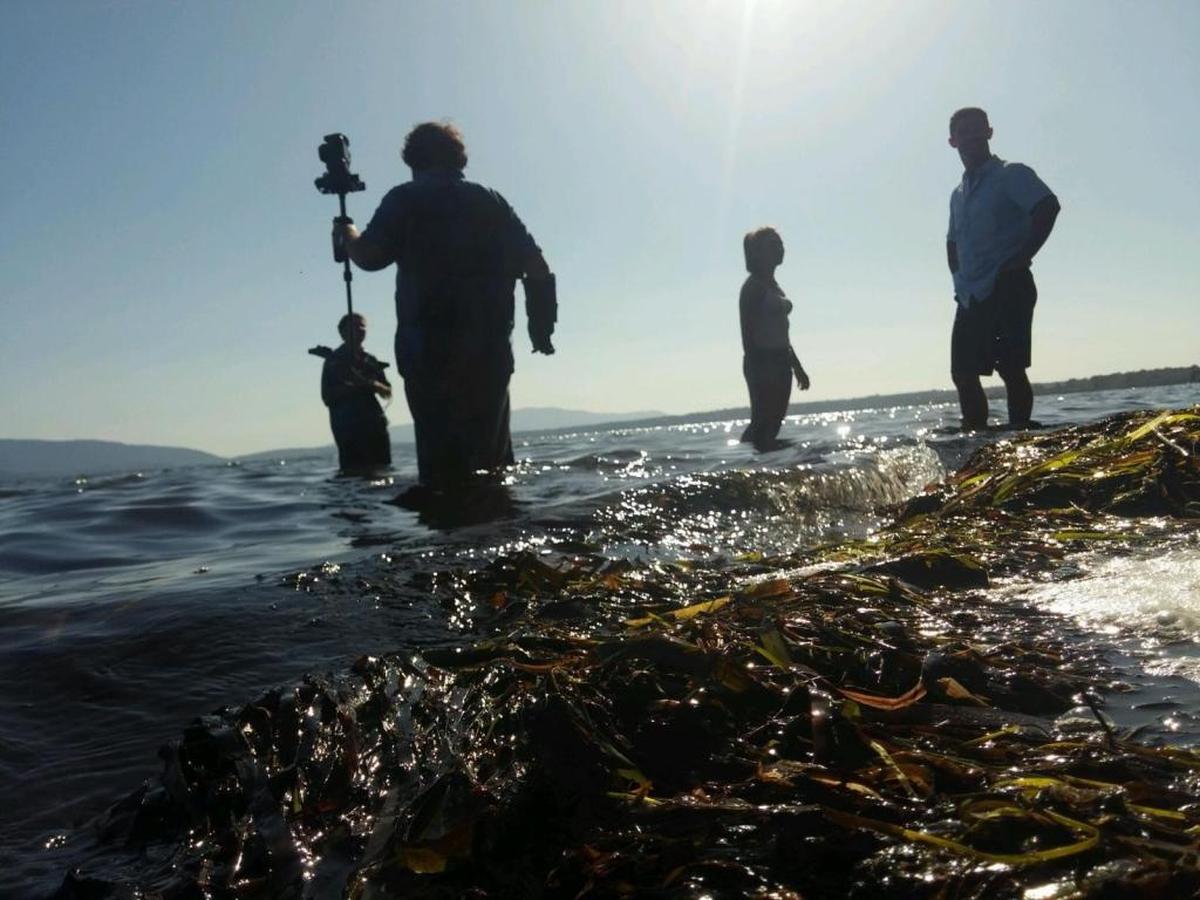 The film crew of “Gone” – directors Conor O’Keefe and Michael Barone, and actors Olivia Mangione and Callahan Peters – prepare for a shoot at Bellingham’s Locust Beach. The film screens at 6:30 p.m. Thursday at Pickford Film Center.