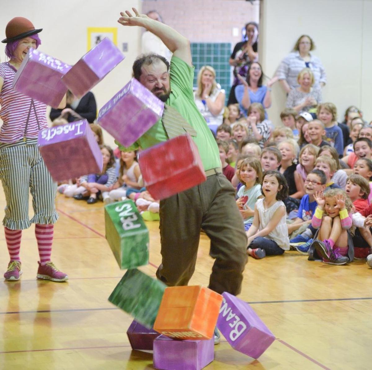Frank and Beans, also known as Jason Quick and Della Plaster, perform “The Real Food Show” at Parkview Elementary in 2015.