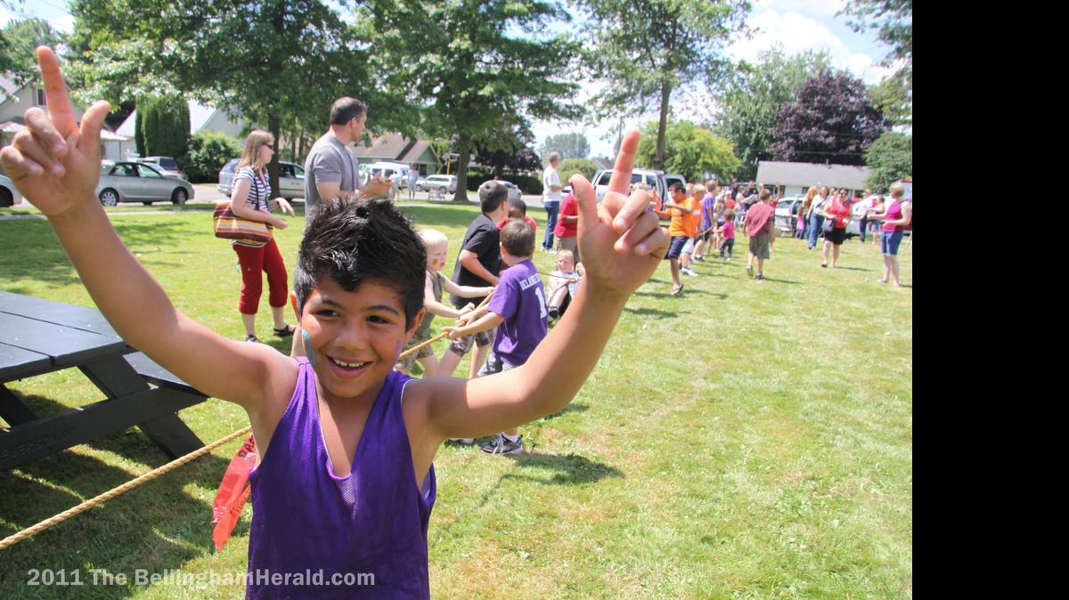 
Families frolic at the Everson Nooksack Summer Festival parade in 2011.
