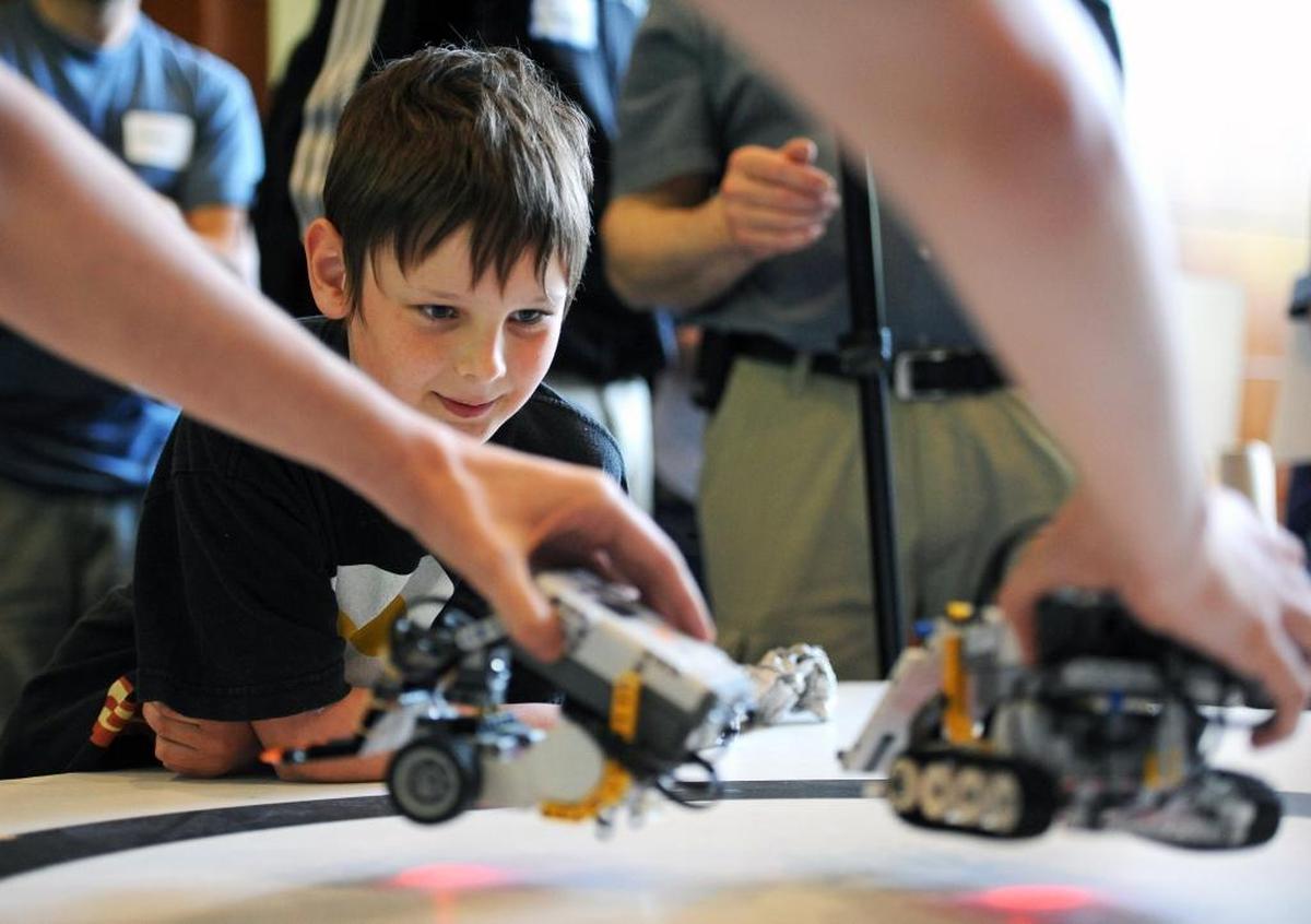 A robot sumo wrestling competition is one of the highlights at the Northwest Robot Festival Friday in the Communications Facility at Western Washington University.