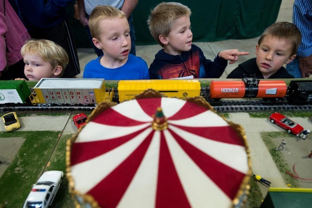 From left: Oliver Huber, Oliver Jones, Harvey Jones and Dashel Jones admire a circus-themed portion of a model train set at the 30th annual Lynden Lions Club Model Train Show in October 2014.