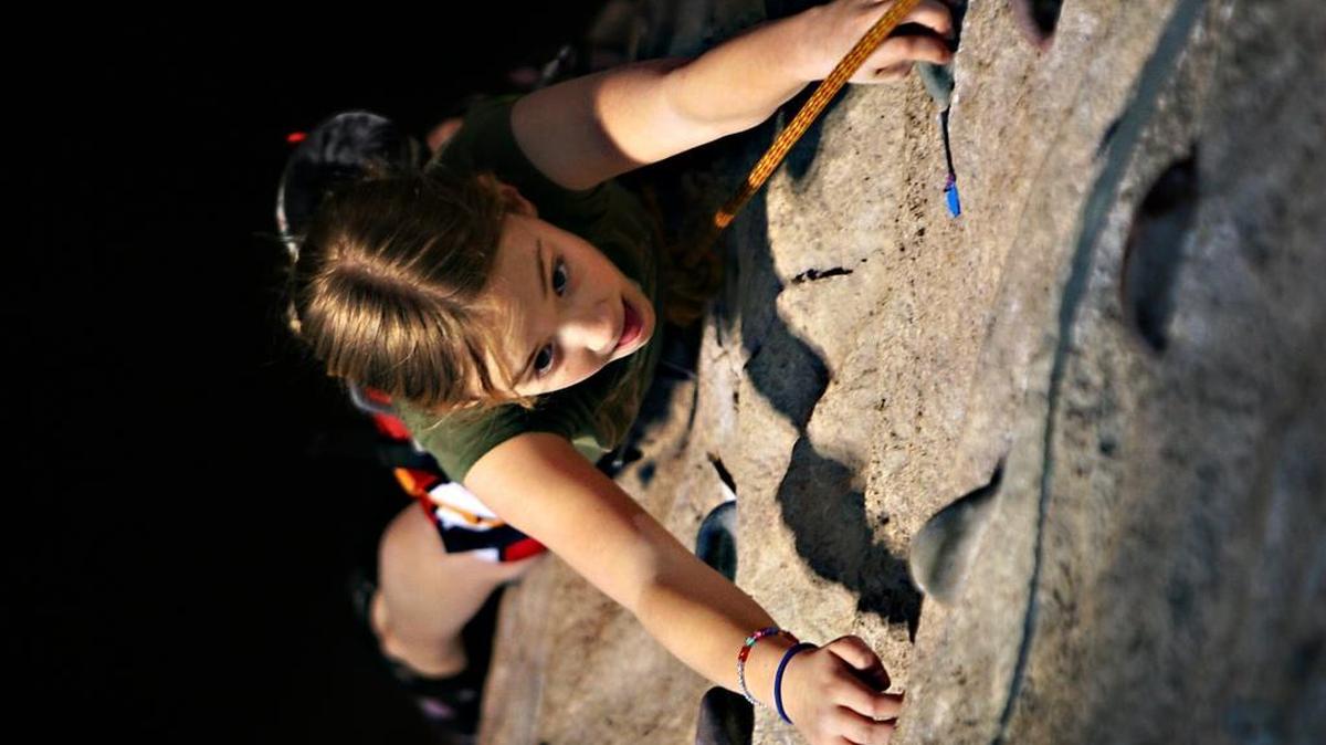 Kayla Culmback looks for her next hold at the YMCA climbing wall in March 2008. Family Climb Time is 9 to 11 a.m. Saturdays at the YMCA, 1256 N. State St. in Bellingham.