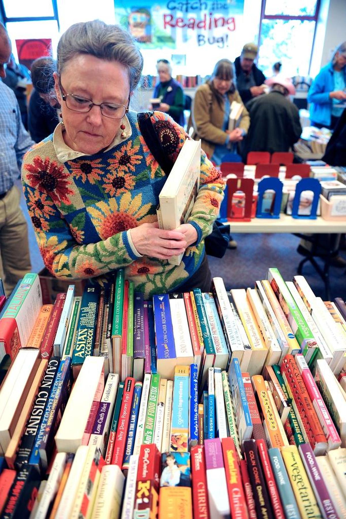 Patrons browse the Friends of the Bellingham Public book sale in March, 2015.