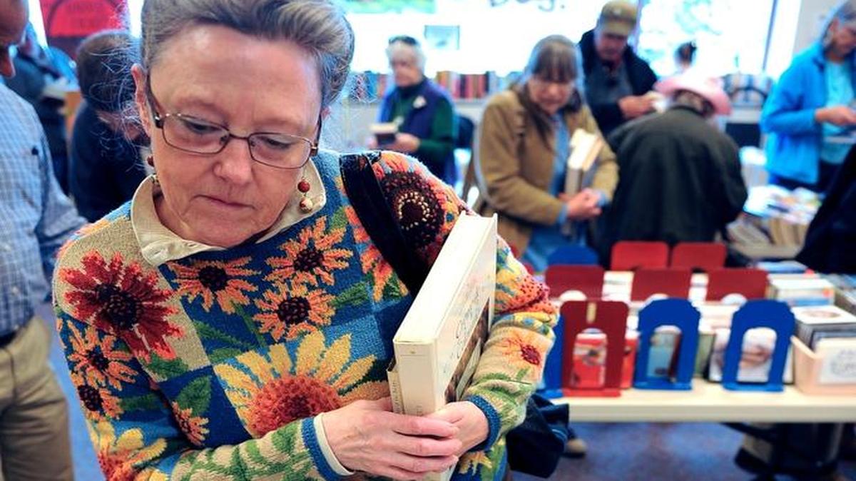 Patrons browse the Friends of the Bellingham Public book sale in March, 2015.