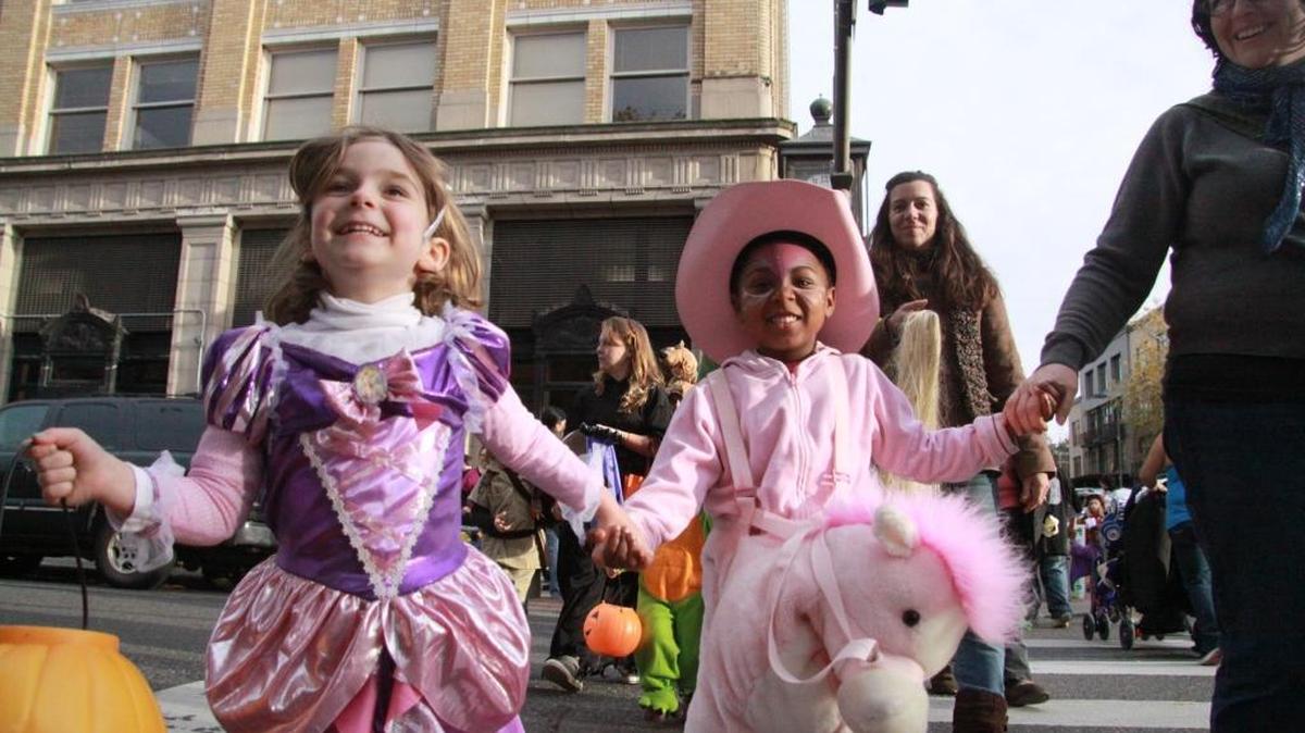 Kids and families trick-or-treat in downtown Bellingham in 2011.