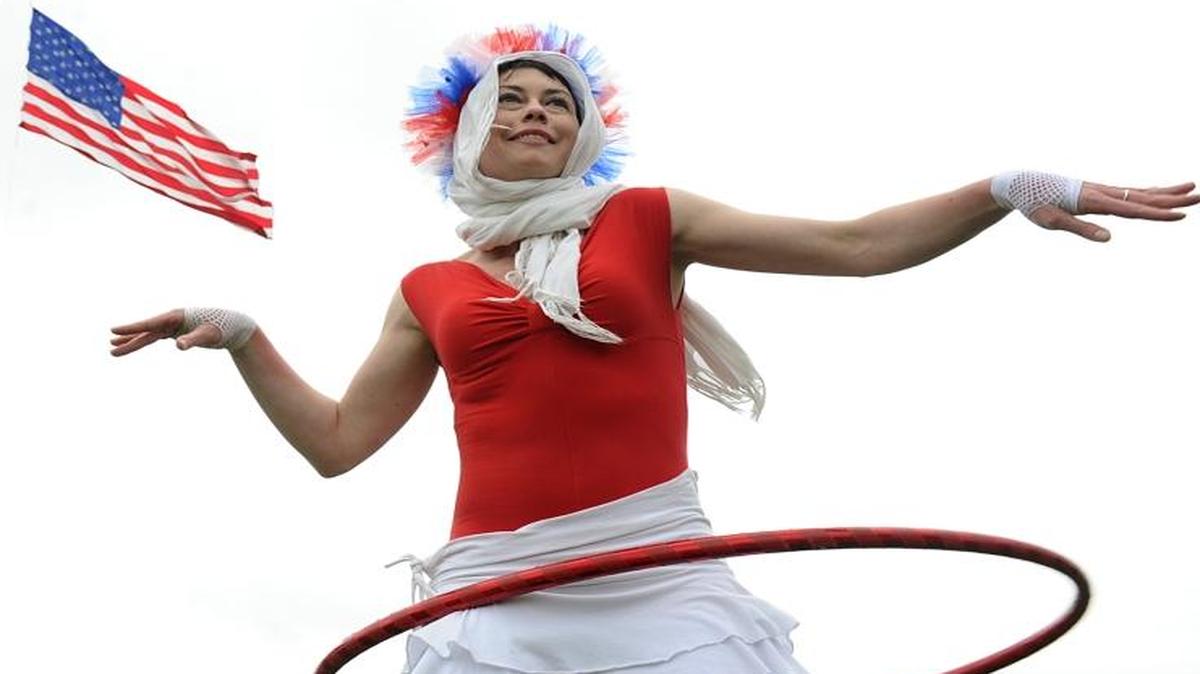 Jaimie Berg, who also goes by her stage name Ms. B Hooping Allure, hula-hoops to live music at the Haggen Fourth of July festivities at Zuanich Park in Bellingham. The 2017 event begins at 11 a.m. Tuesday and concludes with fireworks over the bay.