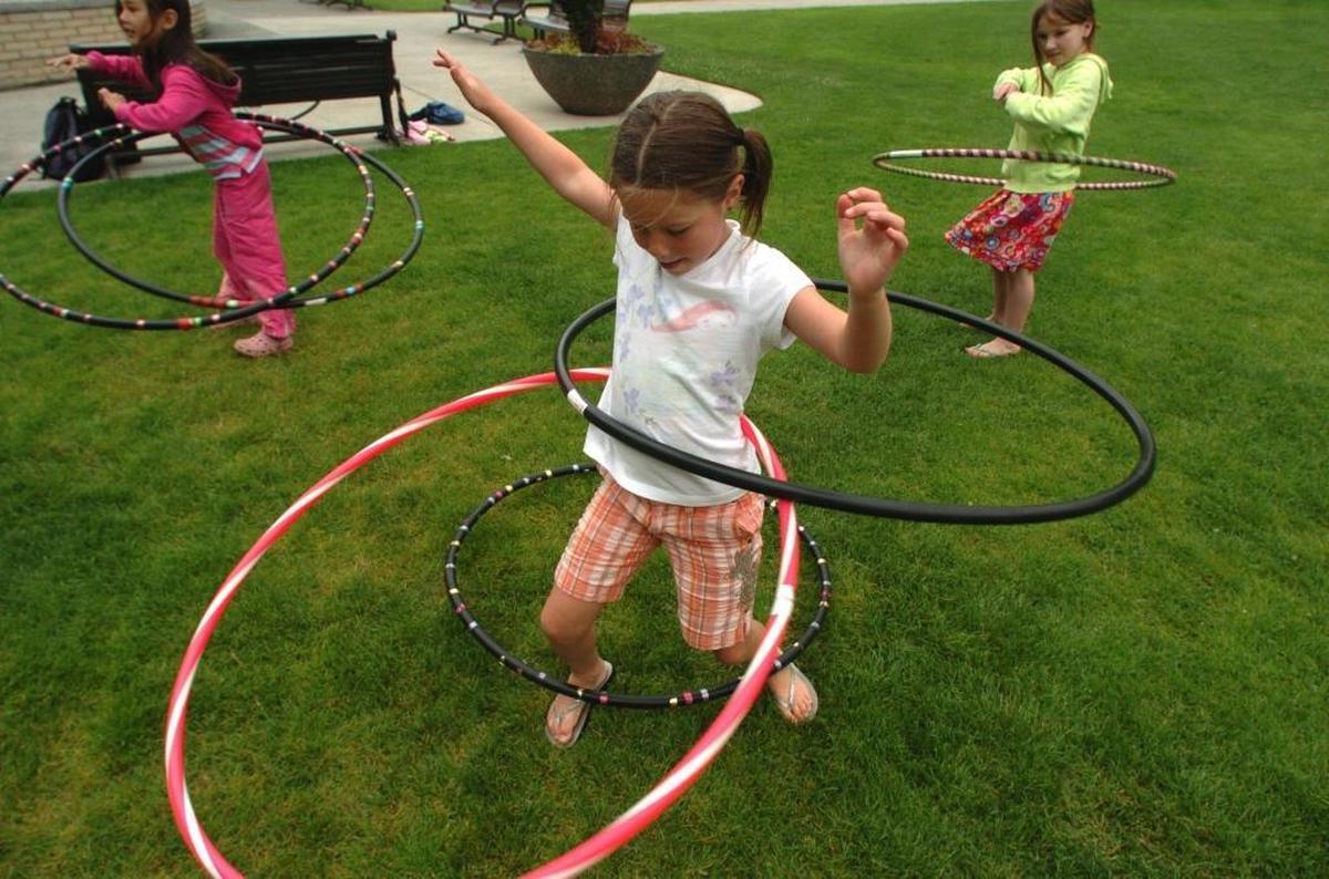 Children get in the spirit during the Hopscotch and Hula Hoops event behind the Bellingham Public Library in 2007.