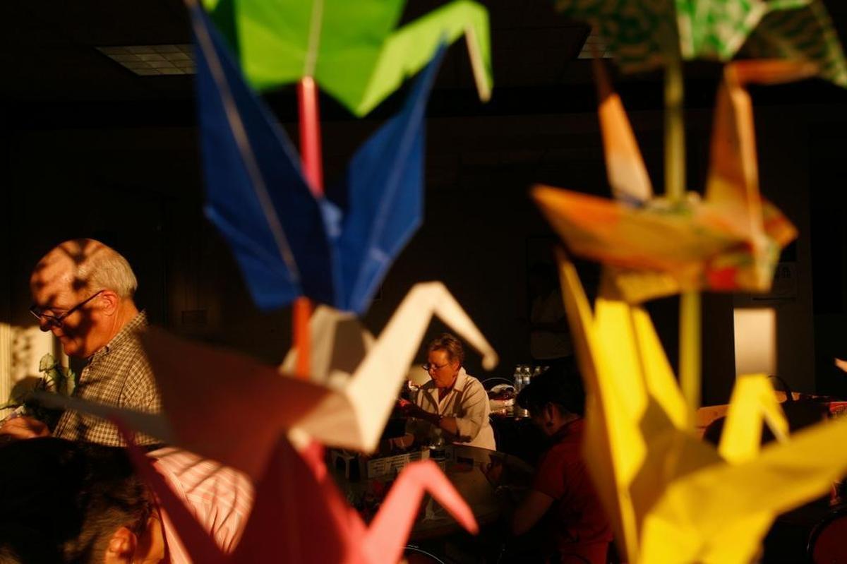 Origami cranes are strung together as part of a charity project in 2008.