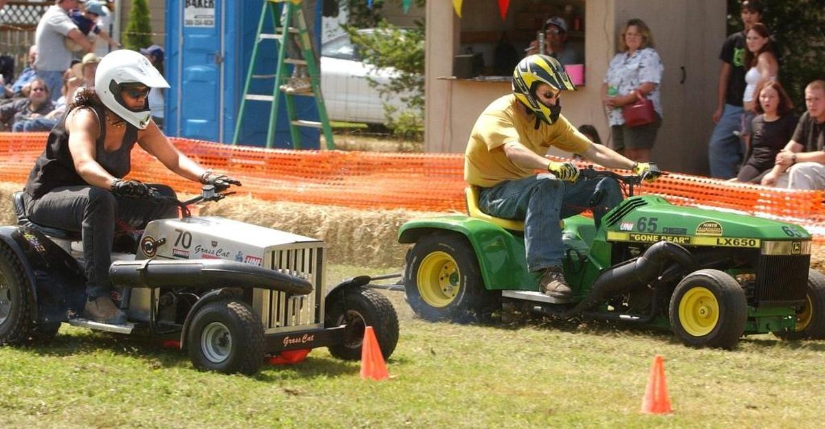 Racers sprint to the finish line at the annual lawnmower races during Custer Days. The 2017 event takes place on Saturday.