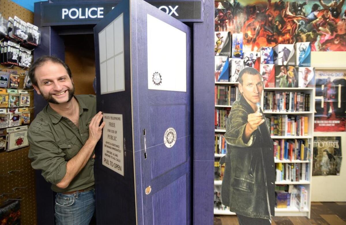 Django Bohren, the owner of the Comics Place, welcomes fans of all ages to Free Comic Book Day on Saturday at its new location at 105 Holly St.