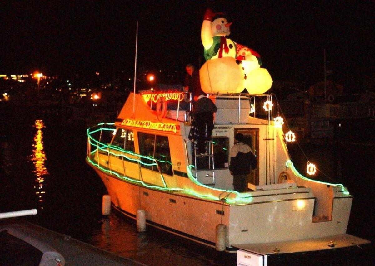 A boat leaves Squalicum Harbor for the Bellingham Yacht Club’s Lighted Boat Parade. The parade starts this year at 6 p.m. Saturday, Dec. 2, at the Ferry Terminal in Fairhaven, weather permitting.