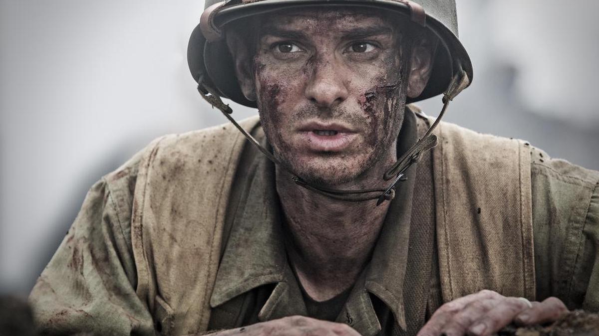Andrew Garfield plays Army medic Desmond T. Doss, who earned the Medal of Honor during the Battle of Okinawa, in the WWII drama “Hacksaw Ridge.”
