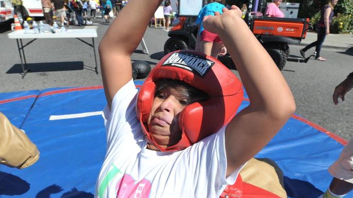 
Yarali Alcaraz, then 9, tries to get out of a sumo wrestling suit at the 2012 Ferndale Street Festival. The 2015 festival is Aug. 28 and 29.
