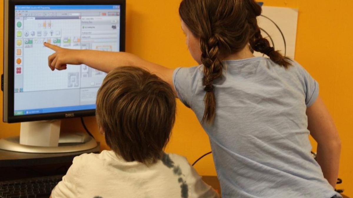 Children participate in a computer robotics program at Spark Museum in summer 2015. Kids can learn the basics of coding on Saturday, Dec. 12.