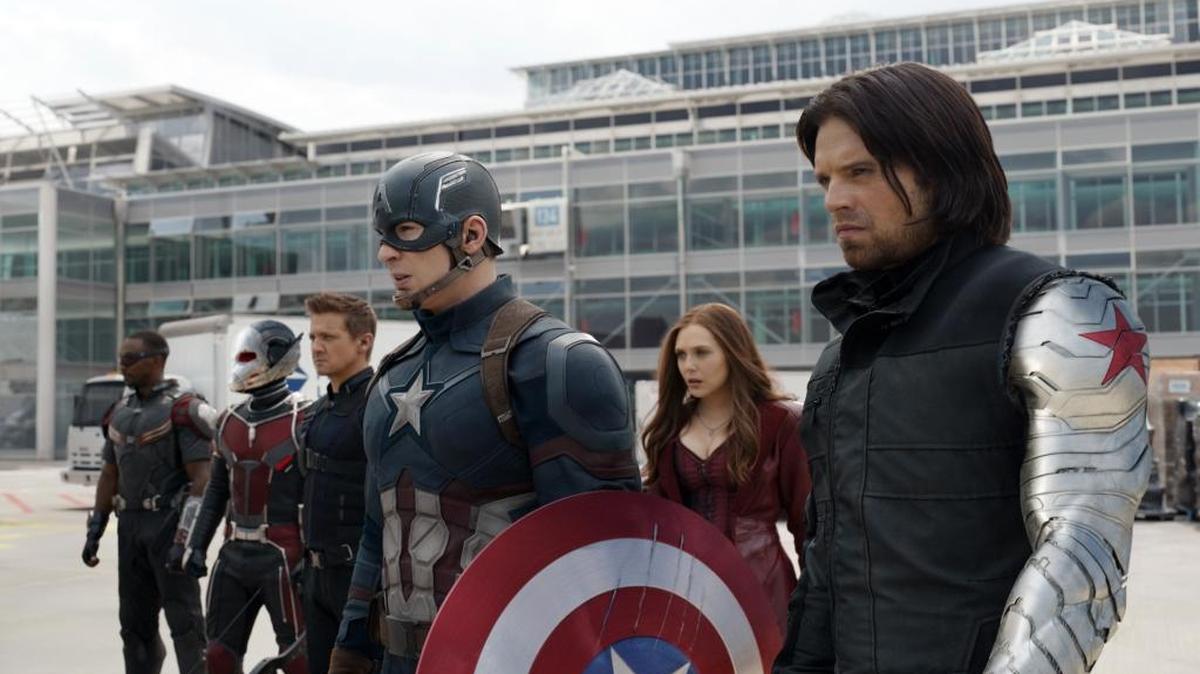 From left, Anthony Mackie, Paul Rudd, Jeremy Renner, Chris Evans, Elizabeth Olsen and Sebastian Stan appear in a scene from “Captain America: Civil War.”