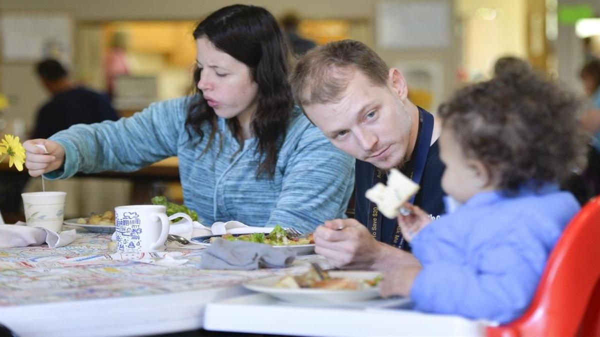 Melissa Darwin, left, Gregory Hegyrozi and Serenity Greco eat lunch at the Maple Alley Inn at Faith Lutheran Church, sponsored by the Opportunity Council. Dine Out for Maple Alley Inn, now in its 17th year, takes place on Tuesday, when restaurants donate a portion their proceeds to the community service.