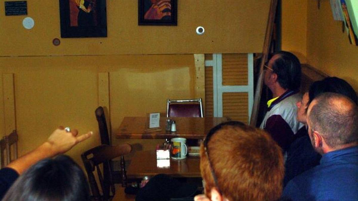 Patrons watch the Tour de France on television at Mount Bakery in 2005, when the restaurant began offering cycling enthusiasts to watch the race together.