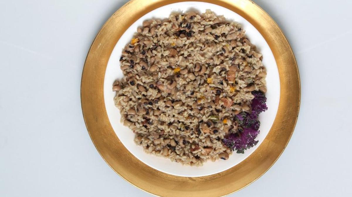 Hoppin’ John, which features black-eyes peas and rice along with smoked pork, sausage or ham, is a traditional New Year’s dish.
