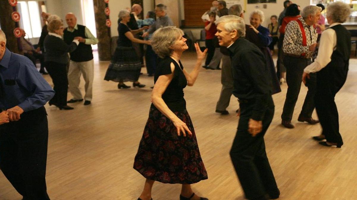 Marilyn Flint, left, and Ellis French dance at the Bellingham Senior Activity Center. The BSAC and the Leopold host a “Good Yule Feast” on Saturday, Dec. 10, at the Leopold Crystal Ballroom followed by a ballroom dance at the BSAC.