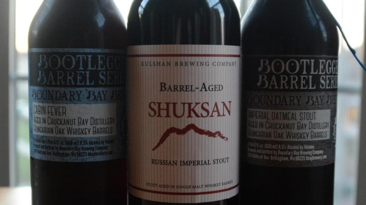Three barrel-aged beers from Boundary Bay and Kulshan Brewing.