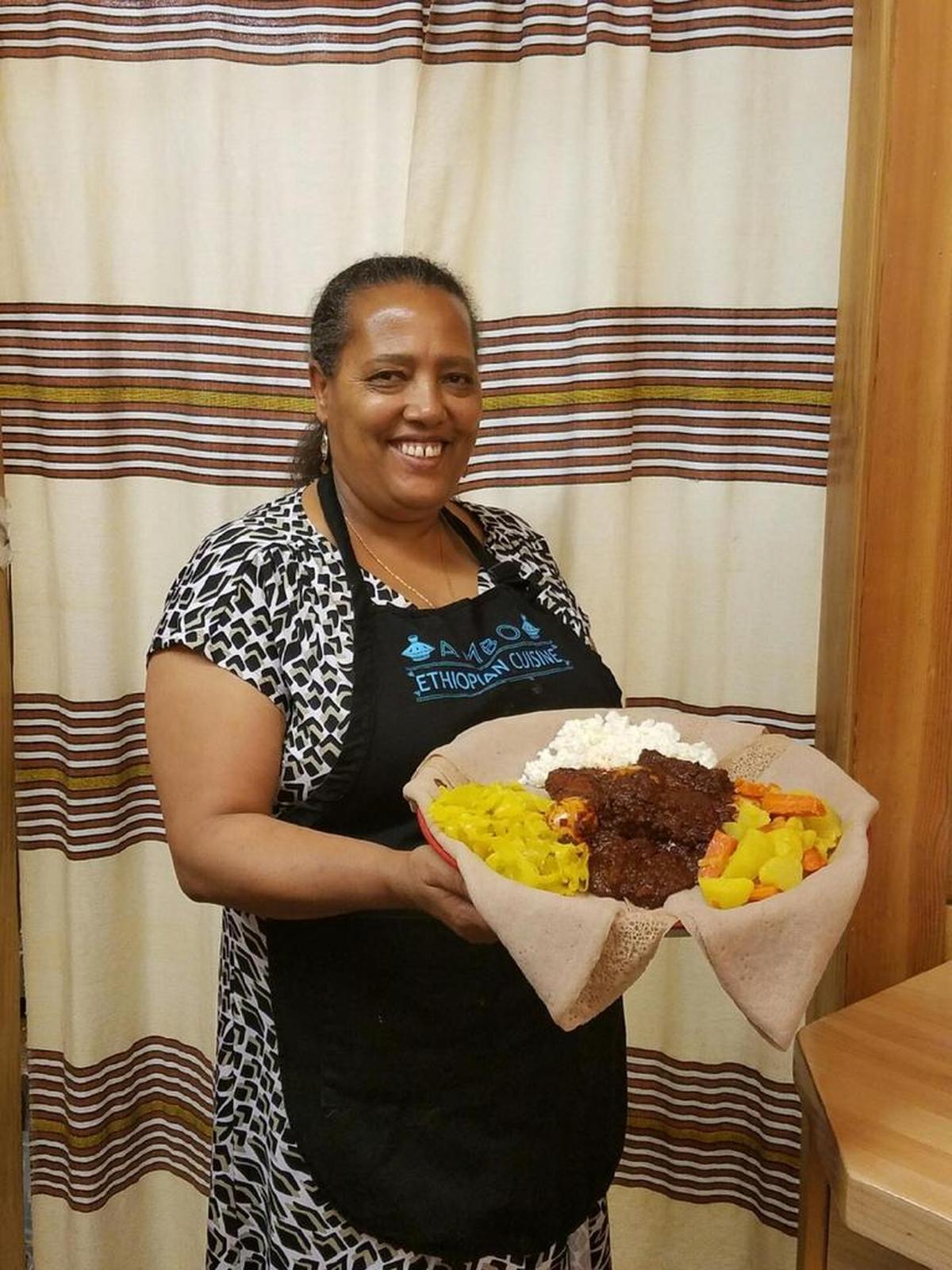 Ethiopian cottage cheese, potatoes and carrots accompany doro wot (chicken stew) at Mulunesh Belay’s Ambo Ethiopian Cuisine in Bellingham Public Market on Cornwall Avenue.