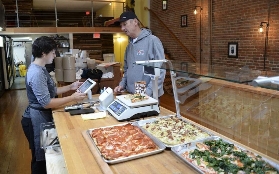 Even customer Ryan Stiles likes the new location of Goat Mountain Pizza; the venue is one of the participating venues at the inaugural “Chow Down(town)” Culinary Event, March 7 through 12, hosted by Downtown Bellingham Partnership.