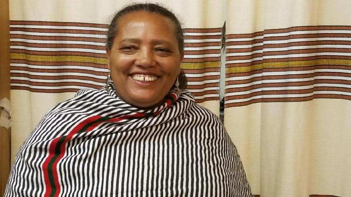 Mulunesh Belay of Ambo Ethiopian Cuisine in Bellingham Public Market on Cornwall Avenue, serves the popular chicken stew known as doro wot.