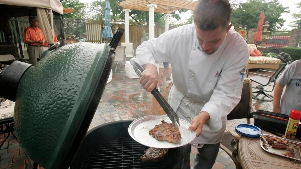 Jerry Hibbard, a culinary student at Sullivan University, prepares beef ribeye in Lexington, Kentucky, in 2006.