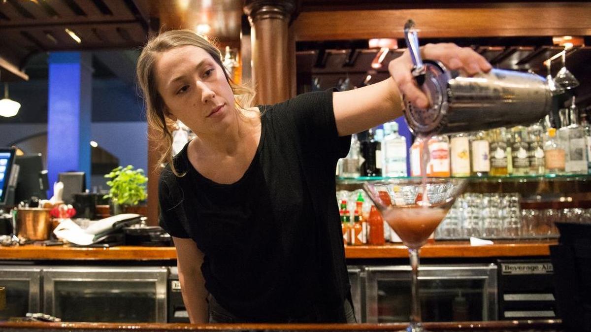 Mallory Turndorf makes a drink while bartending at The Copper Hog on Wednesday, Feb. 20, in Bellingham.