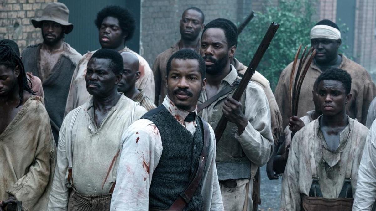 Nate Parker as Nat Turner, center, in "The Birth of a Nation."