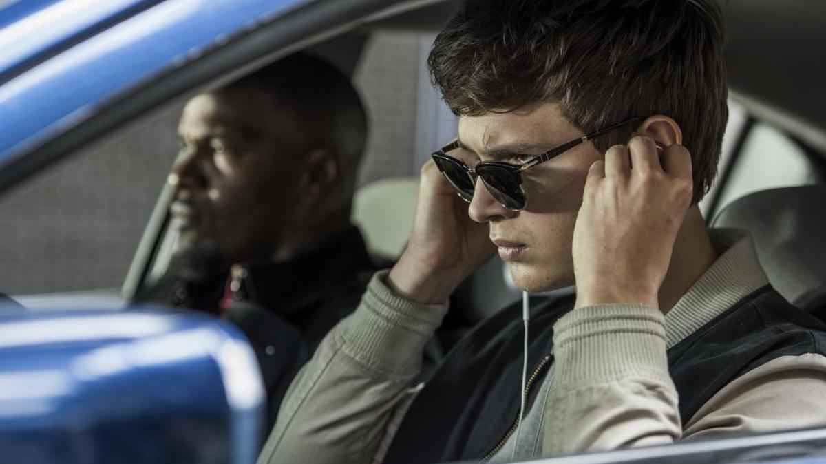 Ansel Elgort, right, and Jamie Foxx in a scene from “Baby Driver,” an homage to the heist film genre